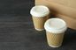 La taille différente Papier d'emballage ondulent les tasses de café de papier a adapté Logo For Hot Drinking aux besoins du client